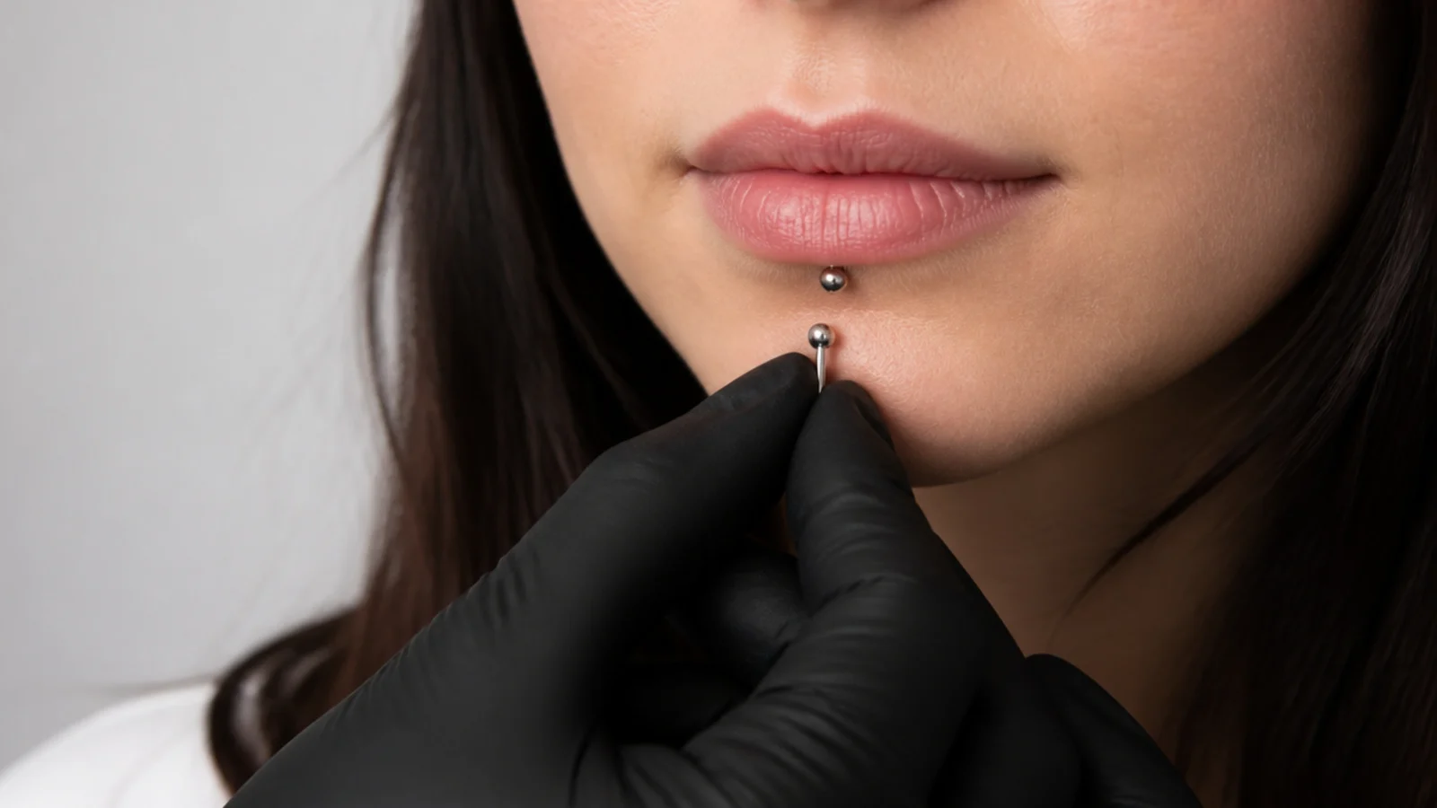 A piercer downsizing jewellery after swelling settles