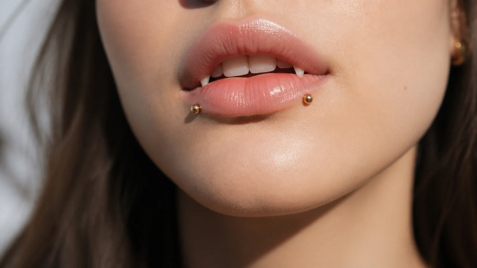 Angel fangs with warm gold stud jewellery