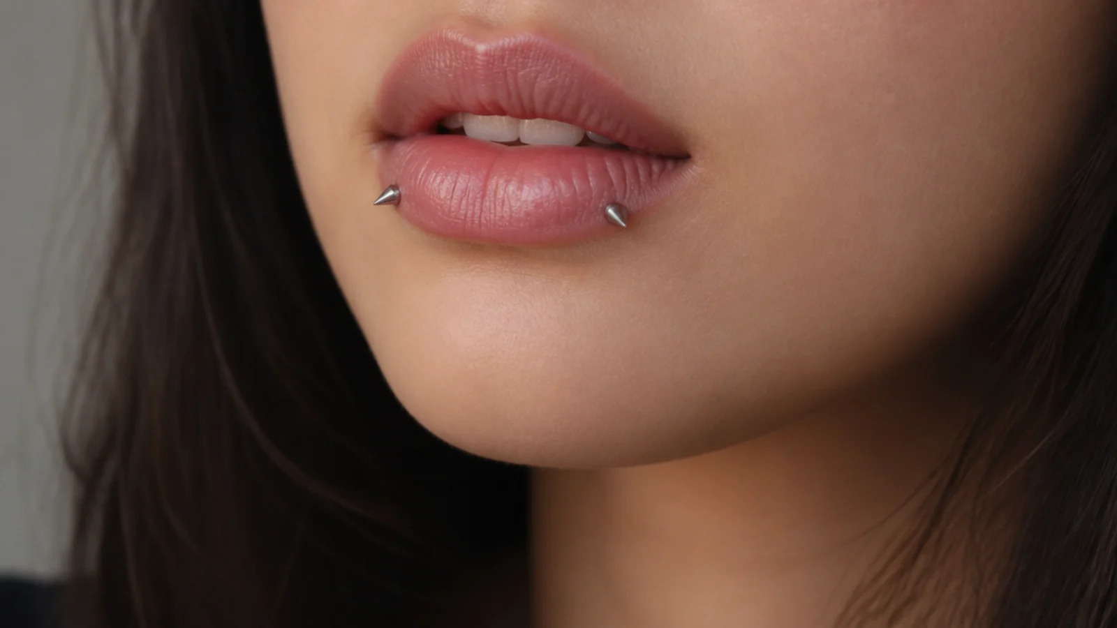 A minimal, understated angel fangs placement