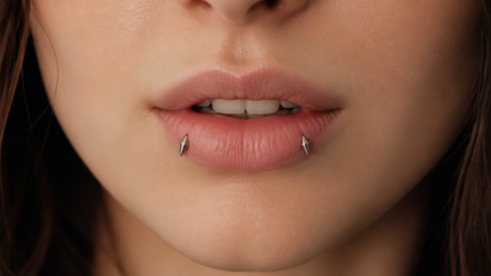 A bold, wider-set angel fangs placement