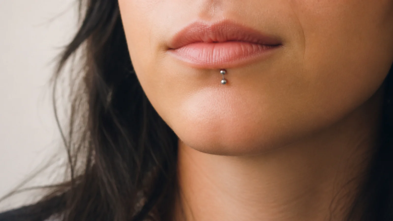 A piercer's portfolio of healed lip piercings