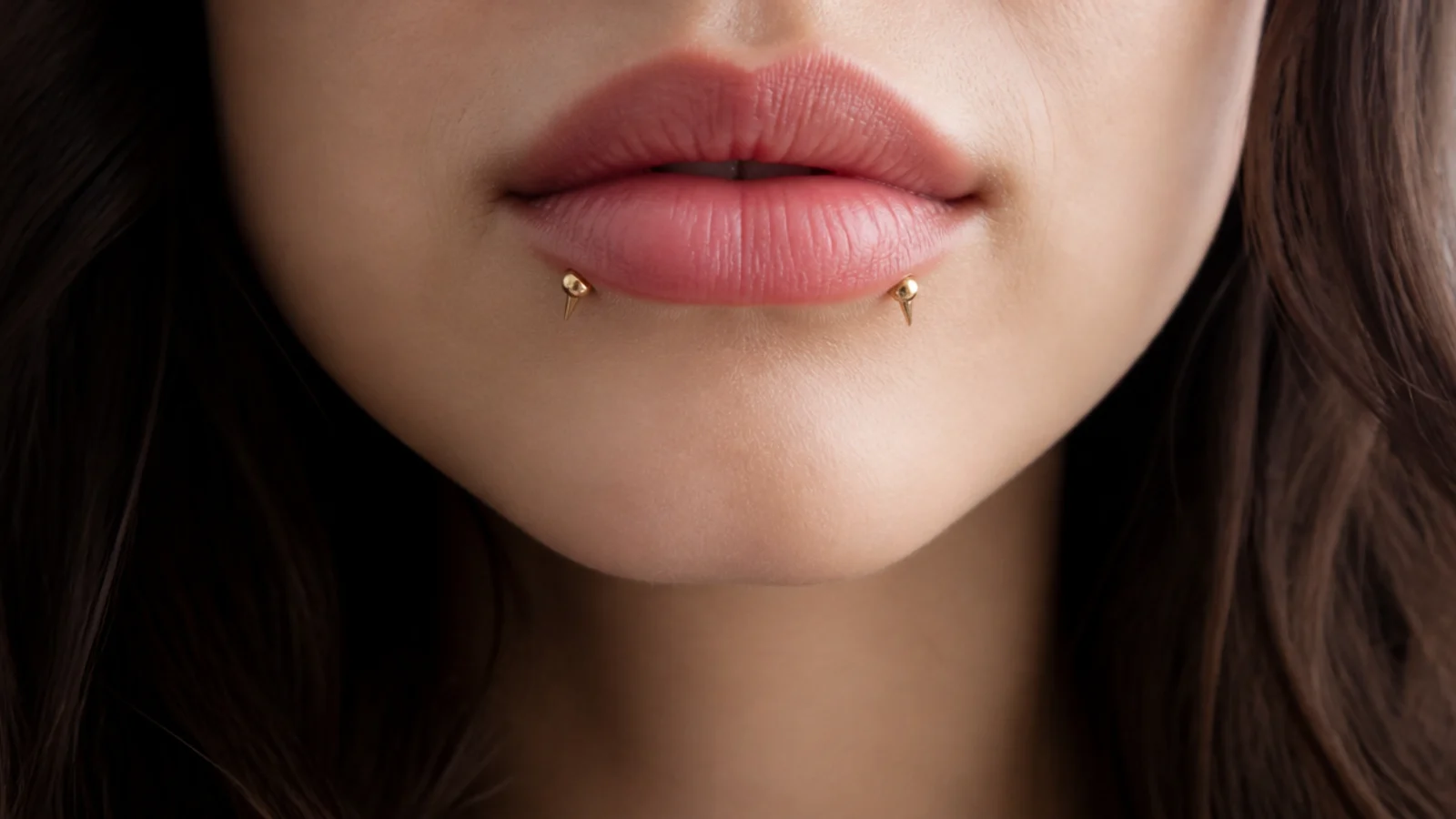 Inverted angel fangs with warm gold studs