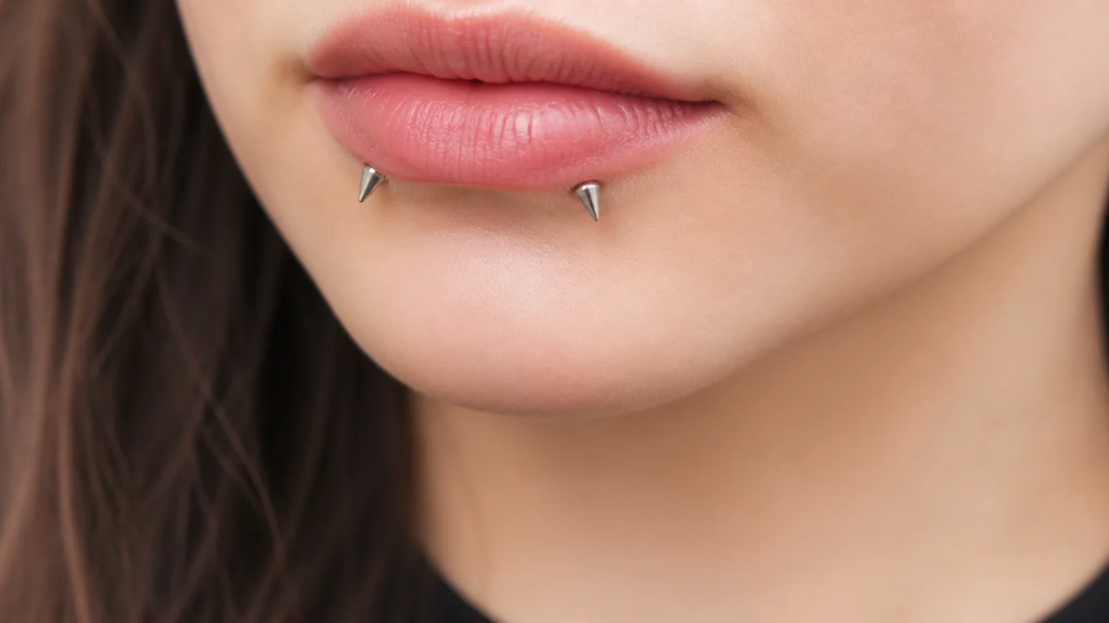 Reverse angel fangs with implant-grade titanium studs