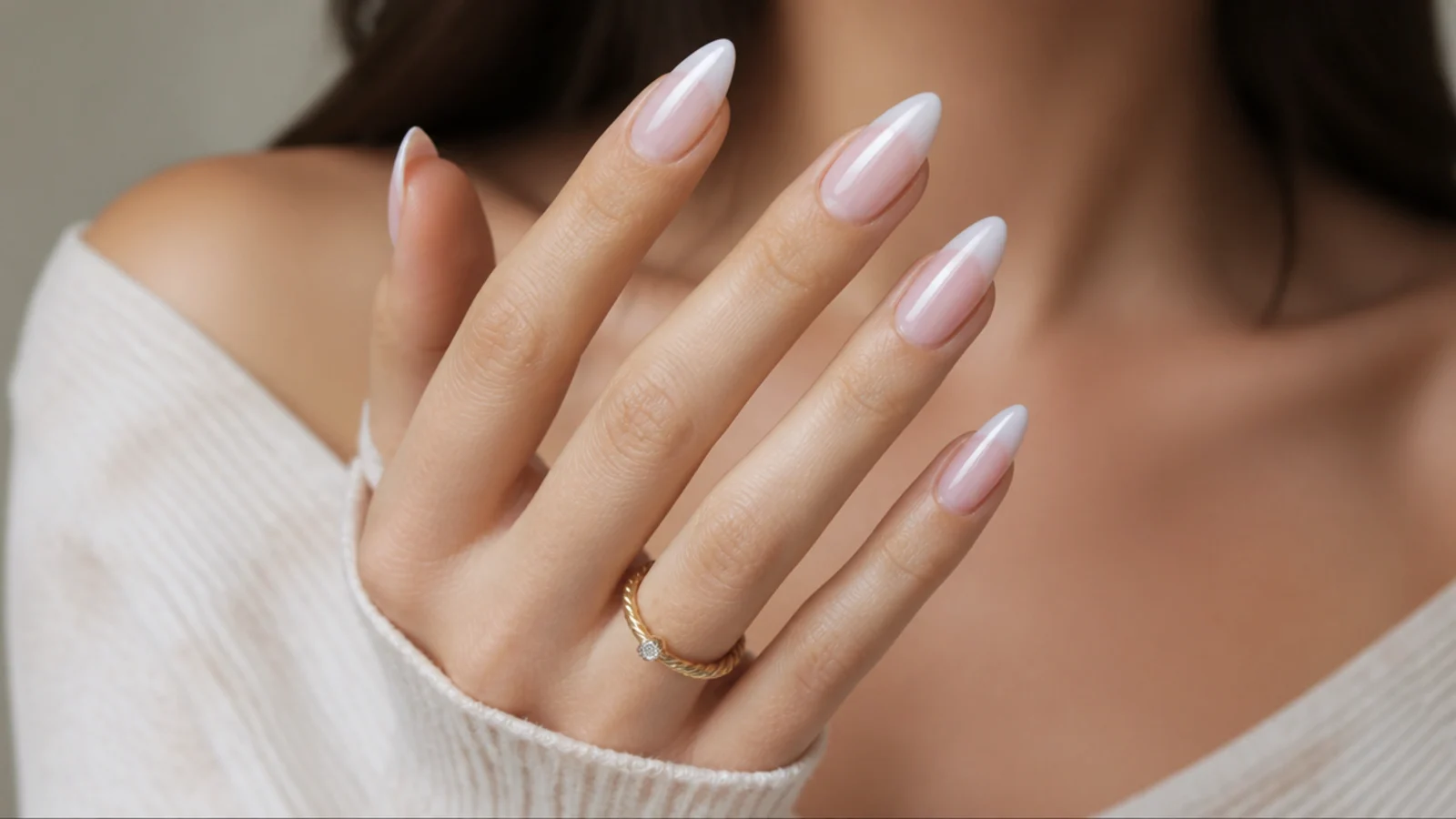 Almond baby boomer nails with a pearl shimmer