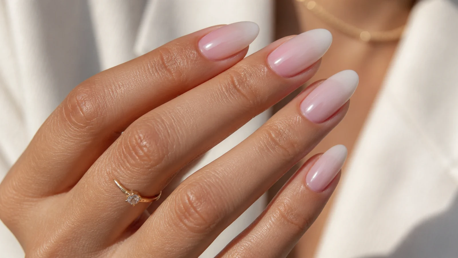 High-gloss almond baby boomer nails