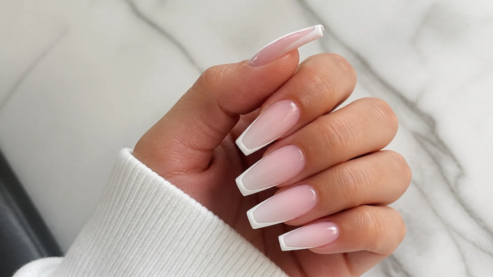 Coffin baby boomer nails with a French line