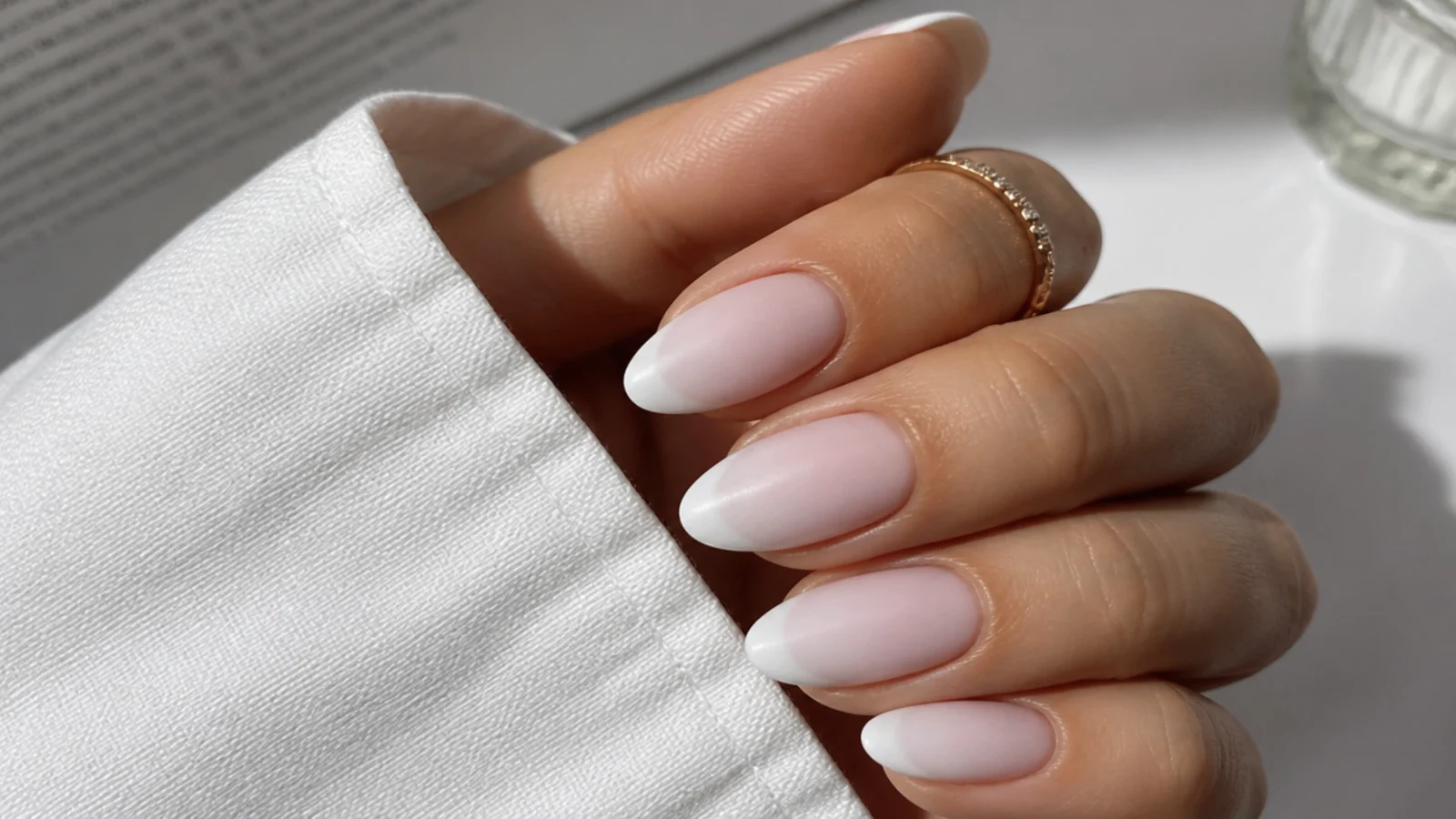 Baby boomer nails with a matte finish and French line
