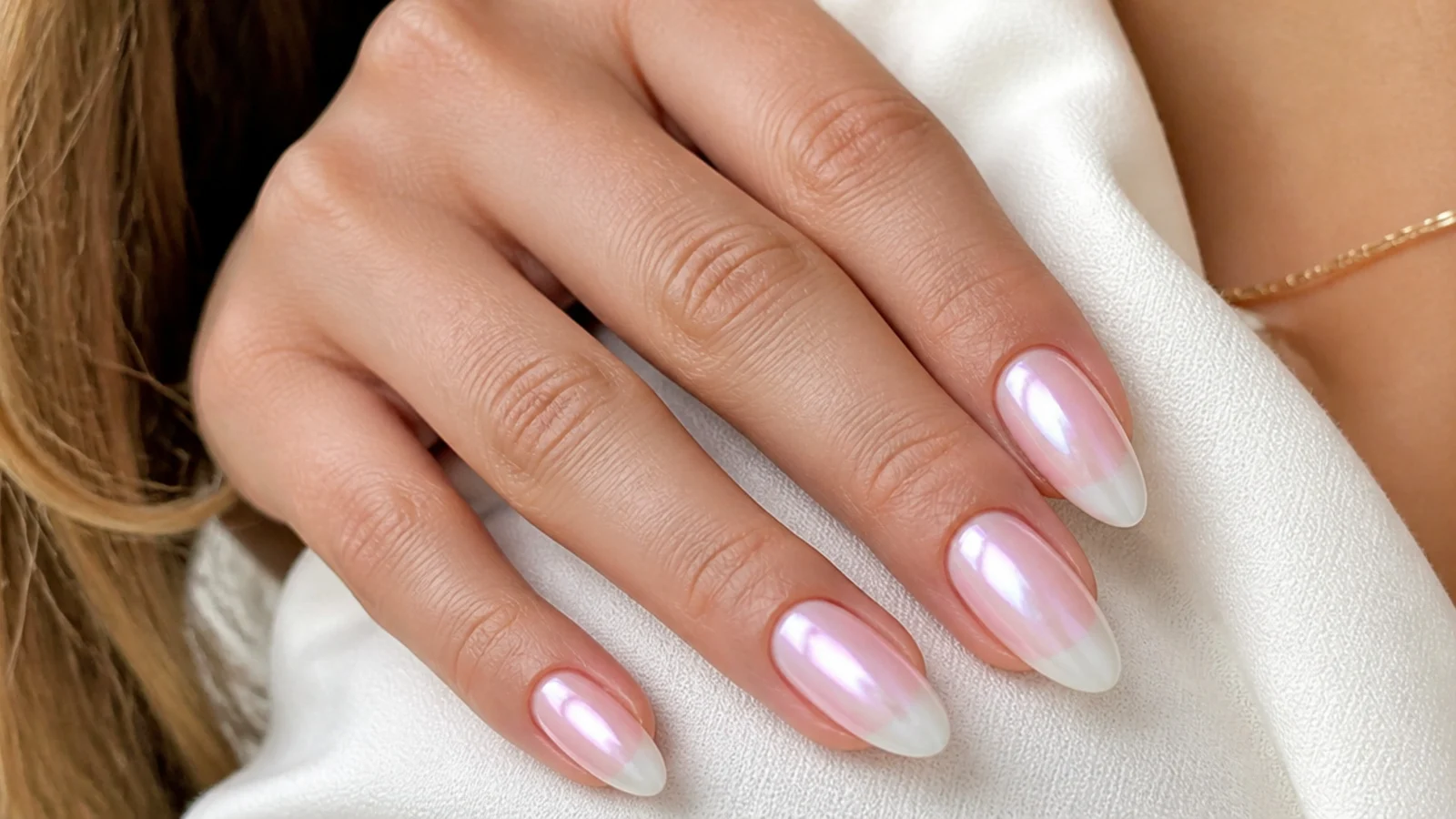 Baby boomer nails with a pearl chrome finish