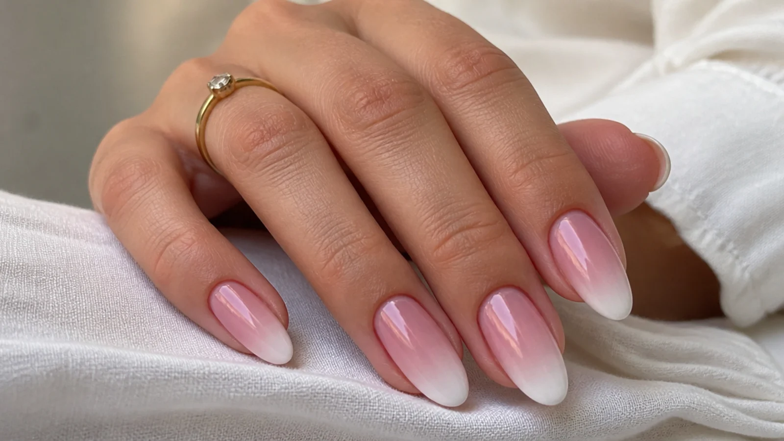 Baby boomer nails with a deeper pink base