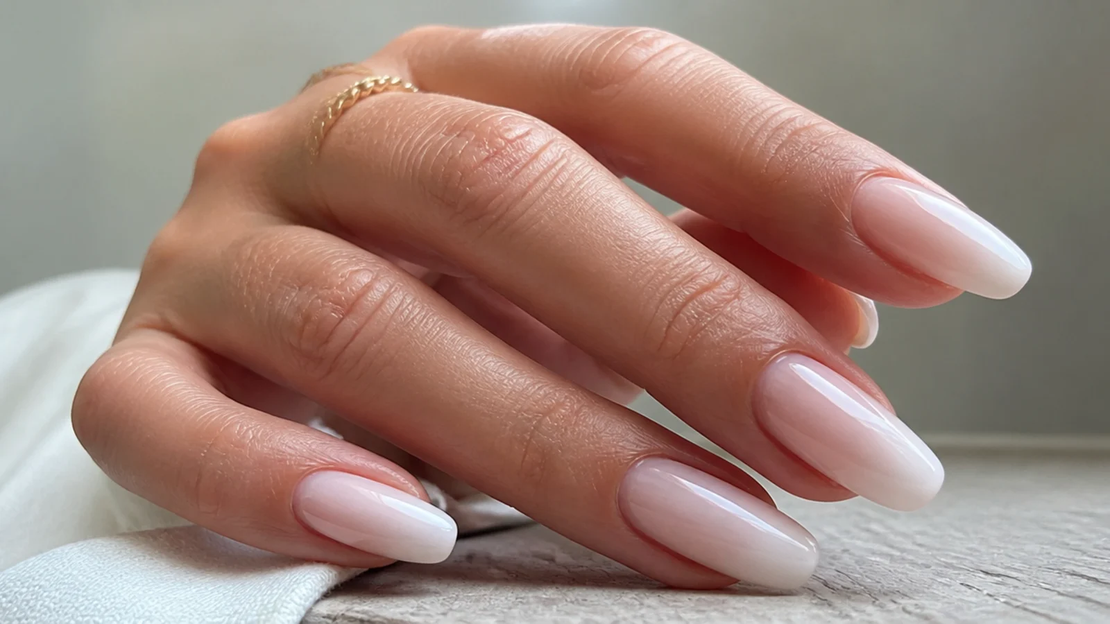 Baby boomer nails with a milky-white heavy tip