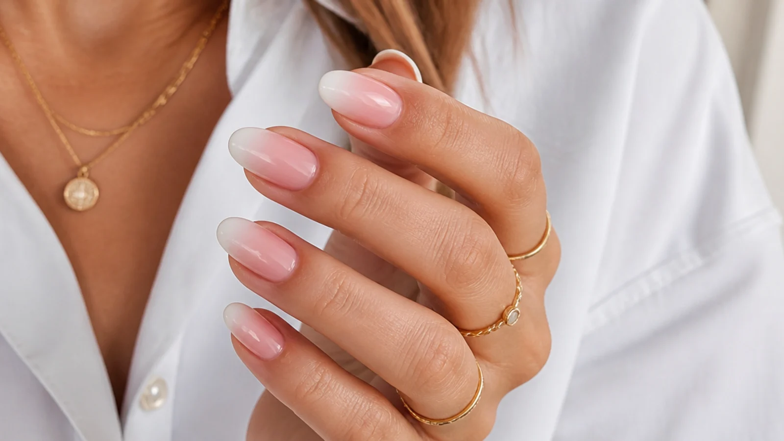 A soft, seamless pink-to-white baby boomer ombre