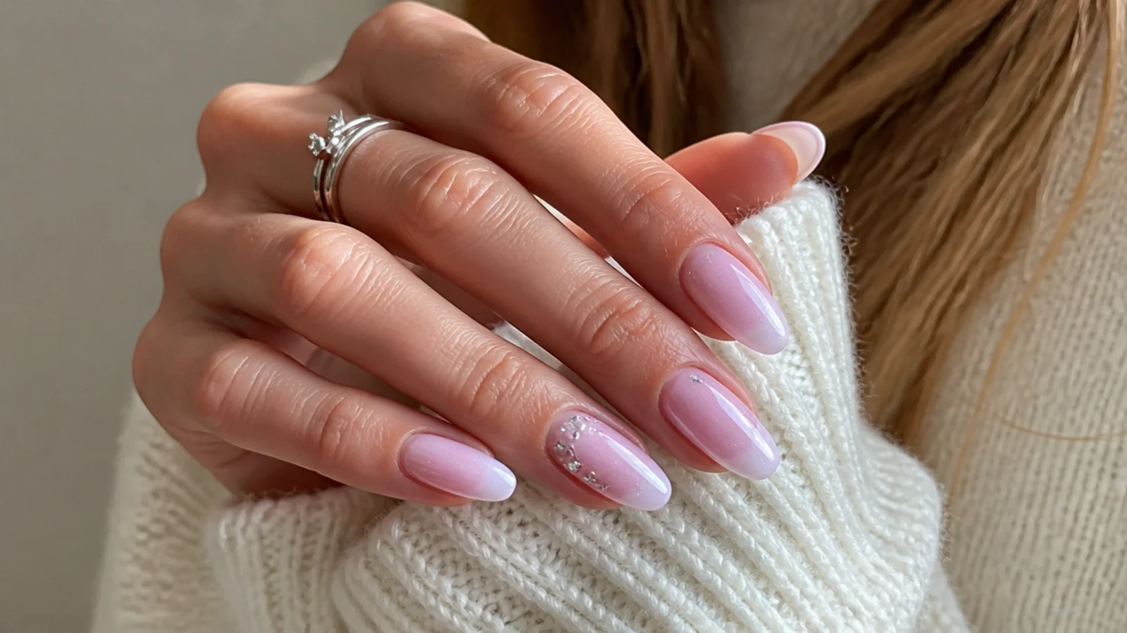 Baby boomer nails with chrome and a few rhinestones