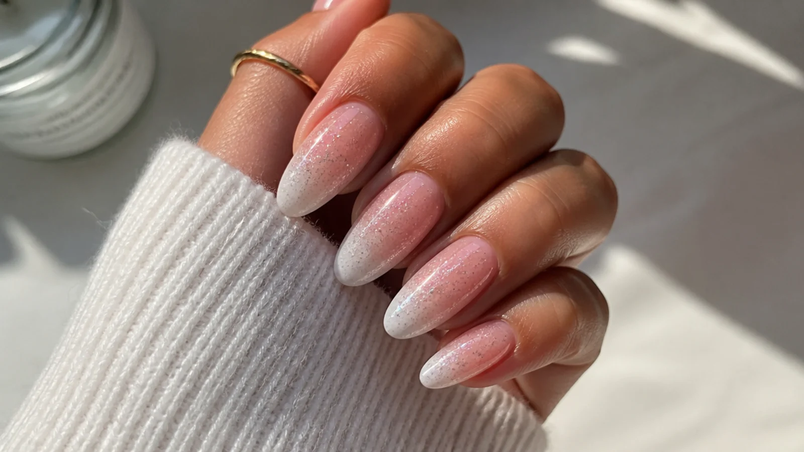 Baby boomer nails with mixed glitter sizes