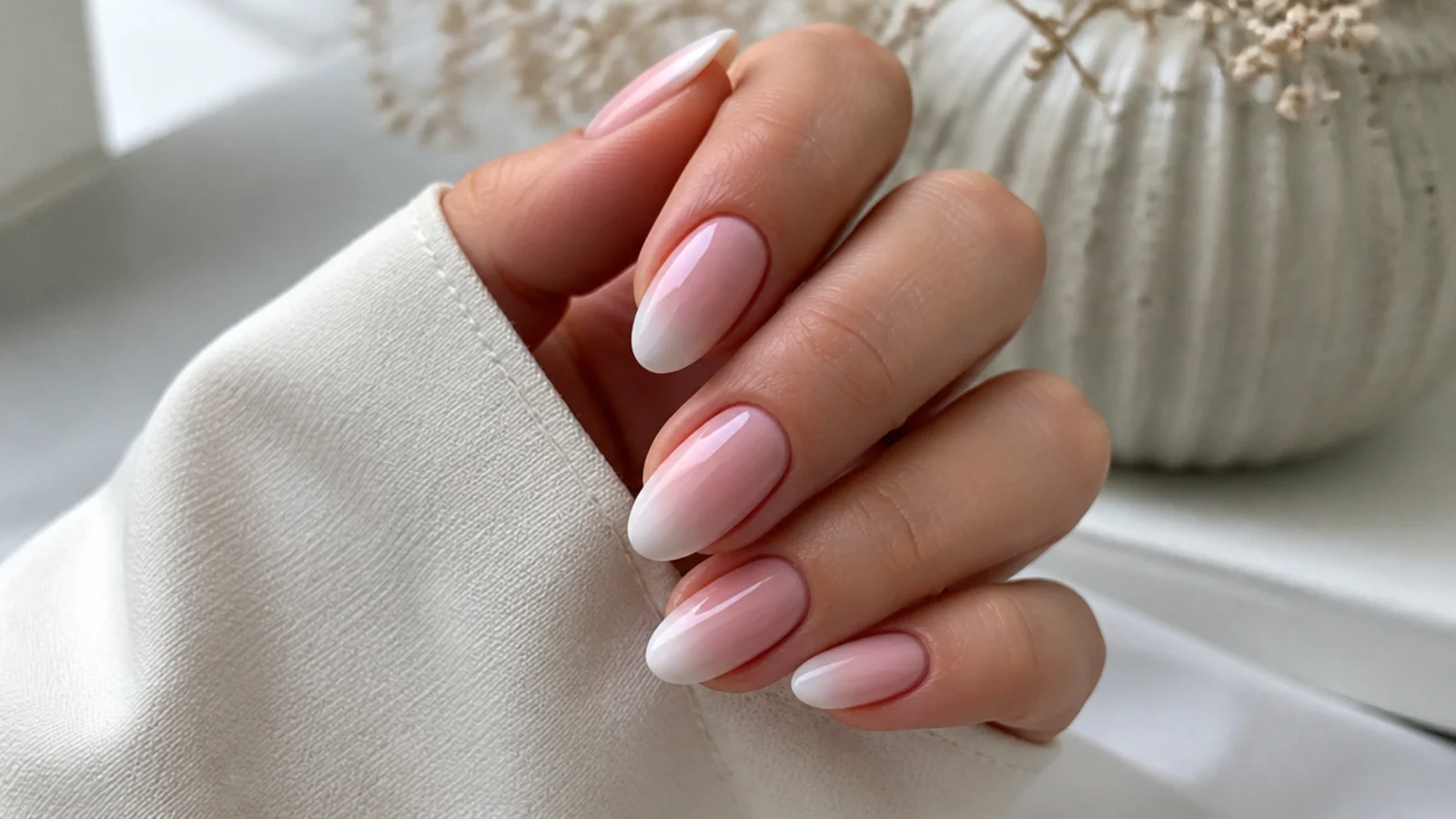 Soft pink baby boomer nails with a seamless ombre
