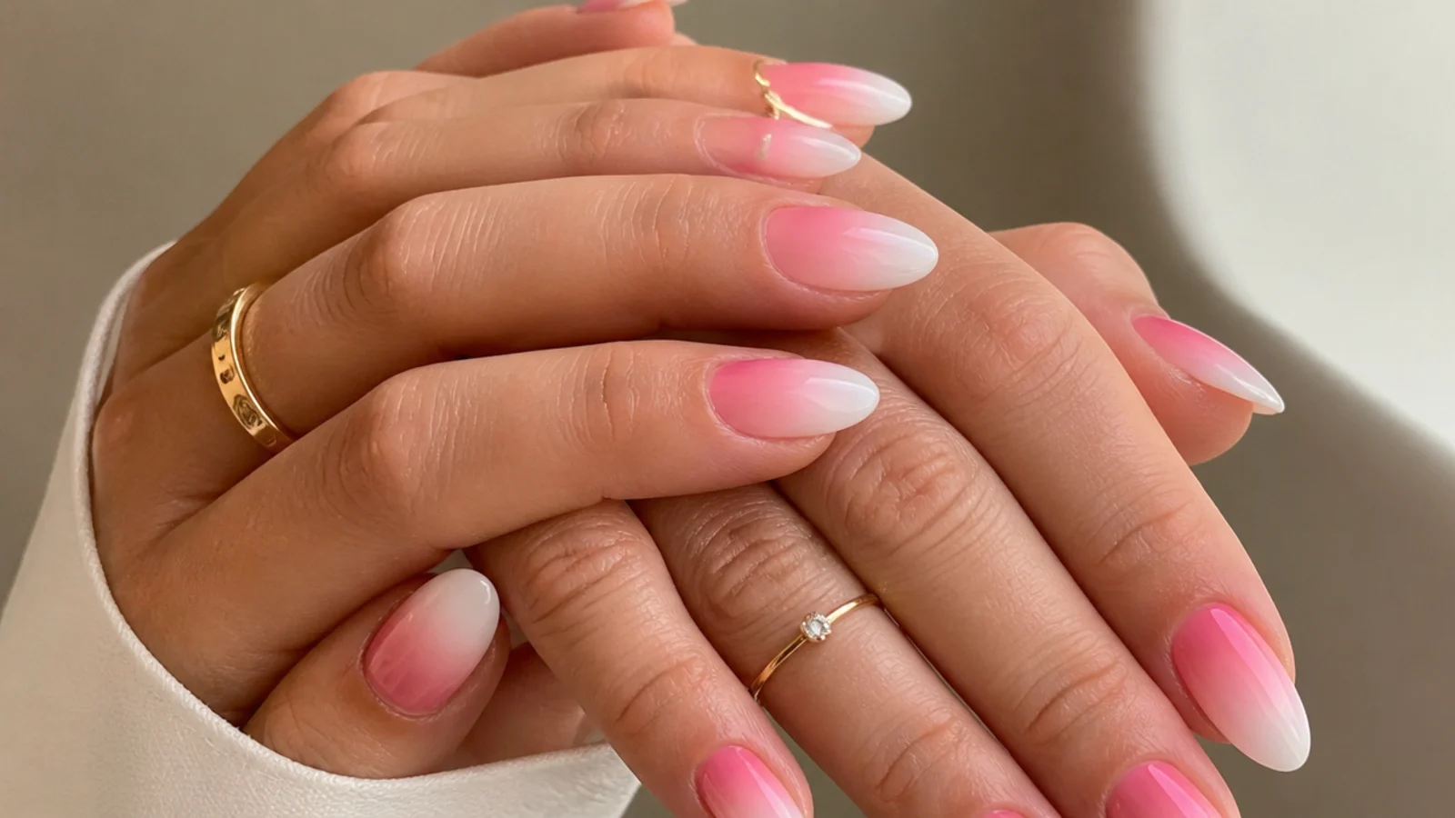 Soft nude and bold bright pink baby boomer nails