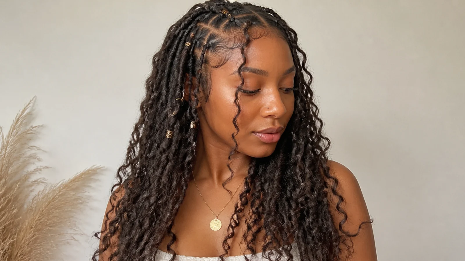 Soft, distressed boho butterfly locs with loose loops