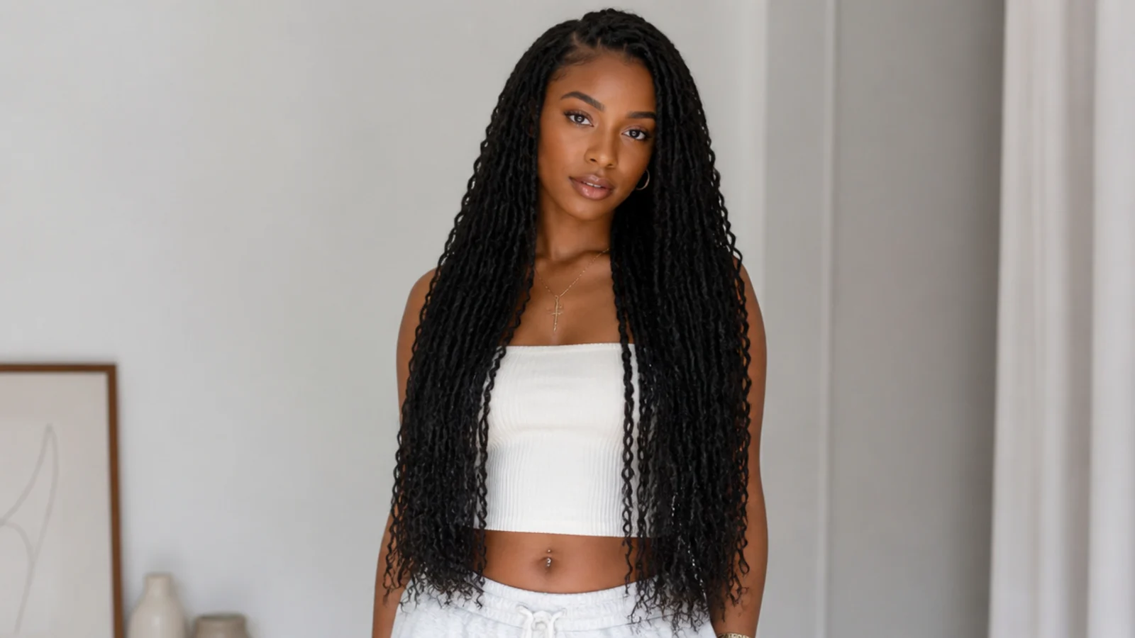 Waist-length natural black butterfly locs