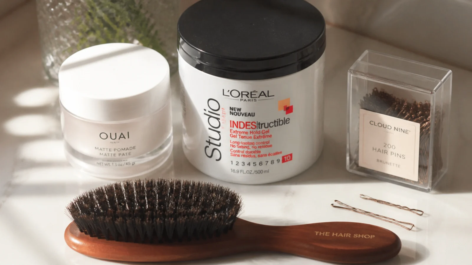 Setting gel, pin curls and a boar-bristle brush for authentic vintage waves