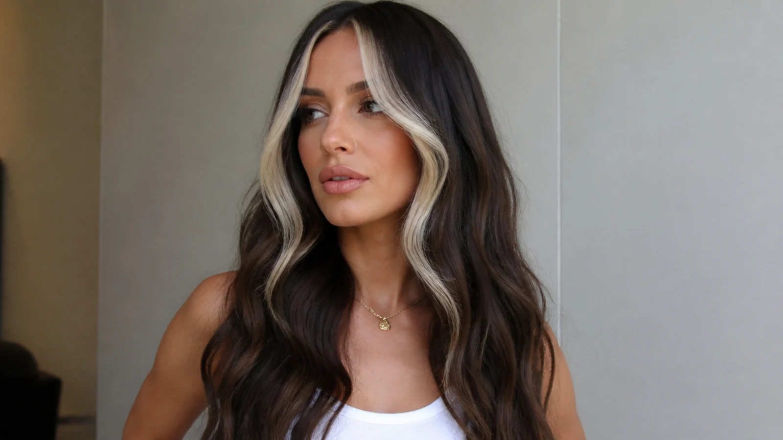 Dark hair with a bold platinum money piece
