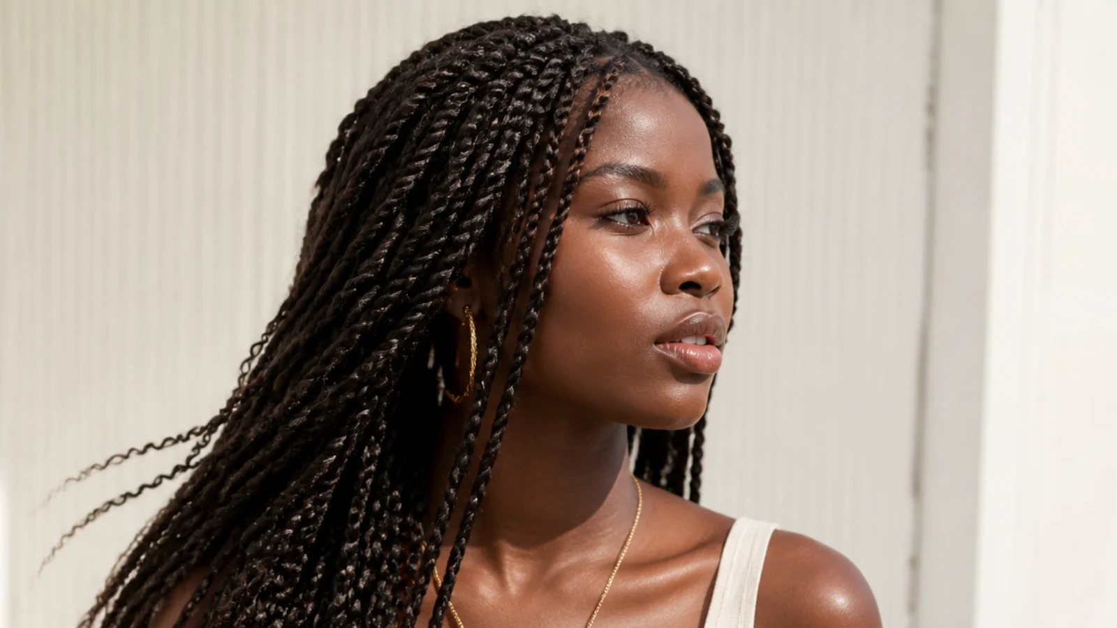 Neat, detailed mini passion twists moving with the light