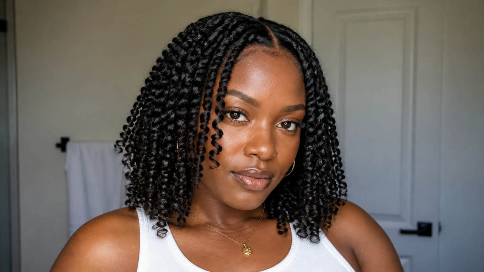 Short passion twists with a clean middle part