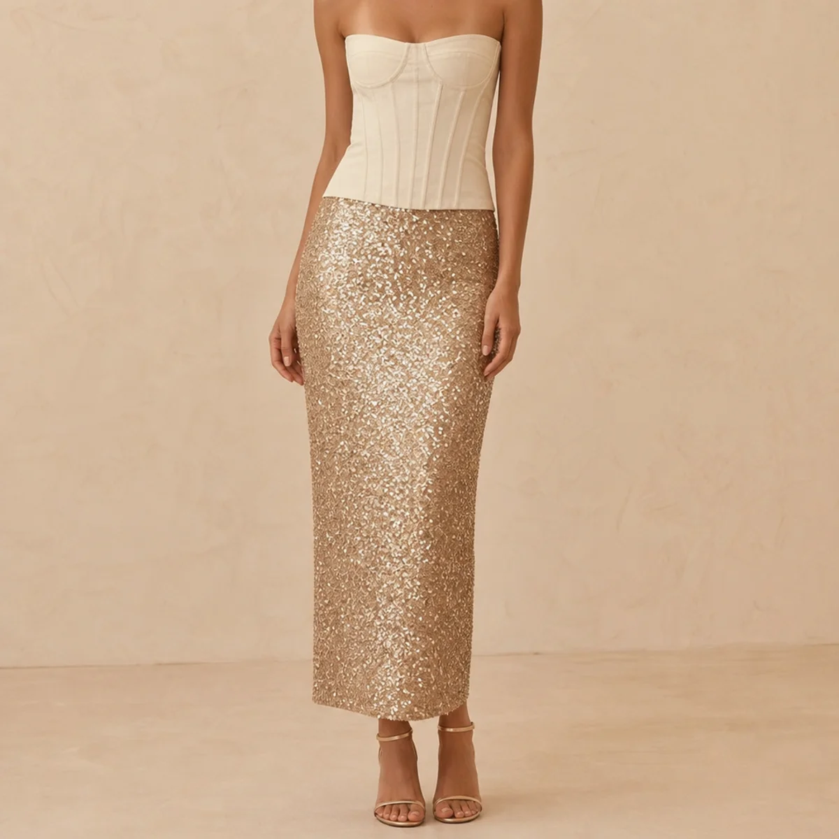 Faceless full-length shot of a corset top with a sequin skirt and heels