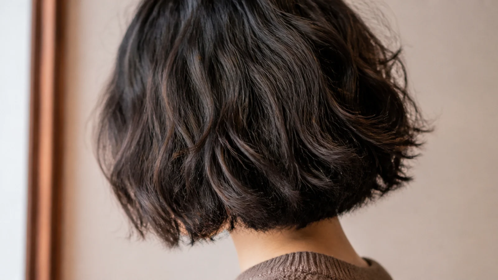 Jaw length bob on thick coarse frizzy hair with hidden interior layers removing bulk