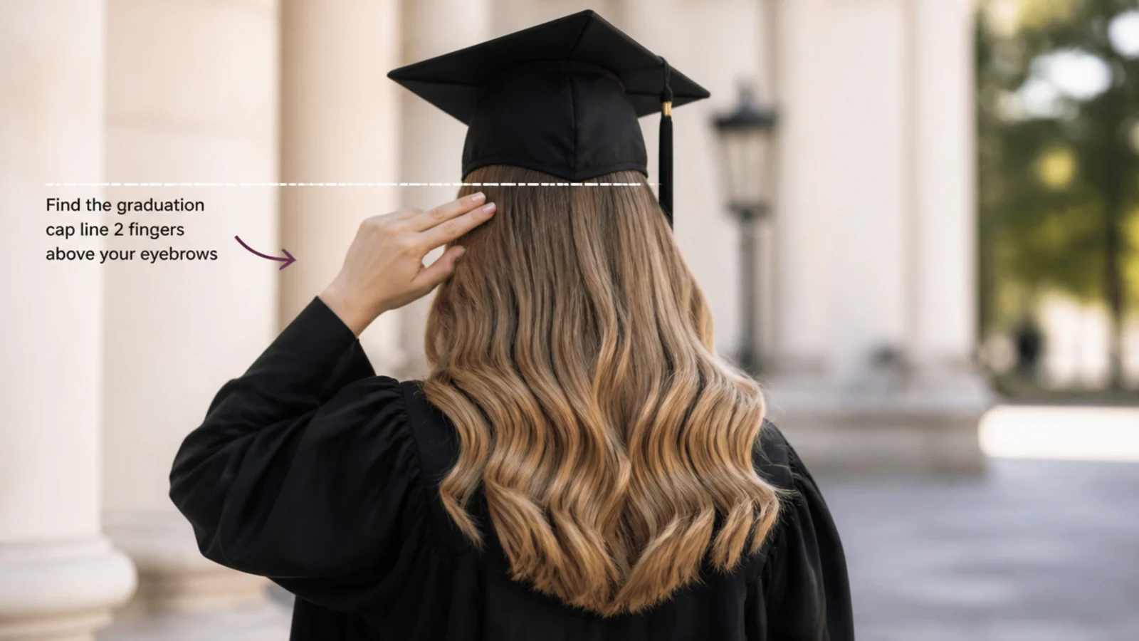 Finding the graduation cap line two fingers above the eyebrows before styling graduation hair