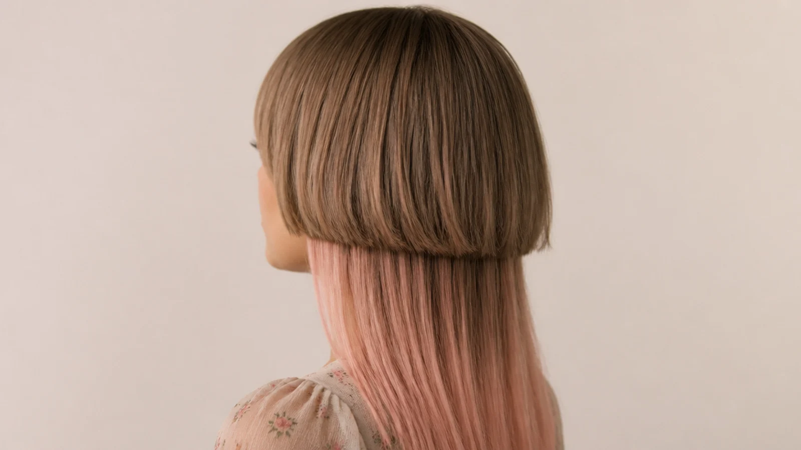 Coquette jellyfish haircut with a soft light brown bell and pale pink ends on long hair