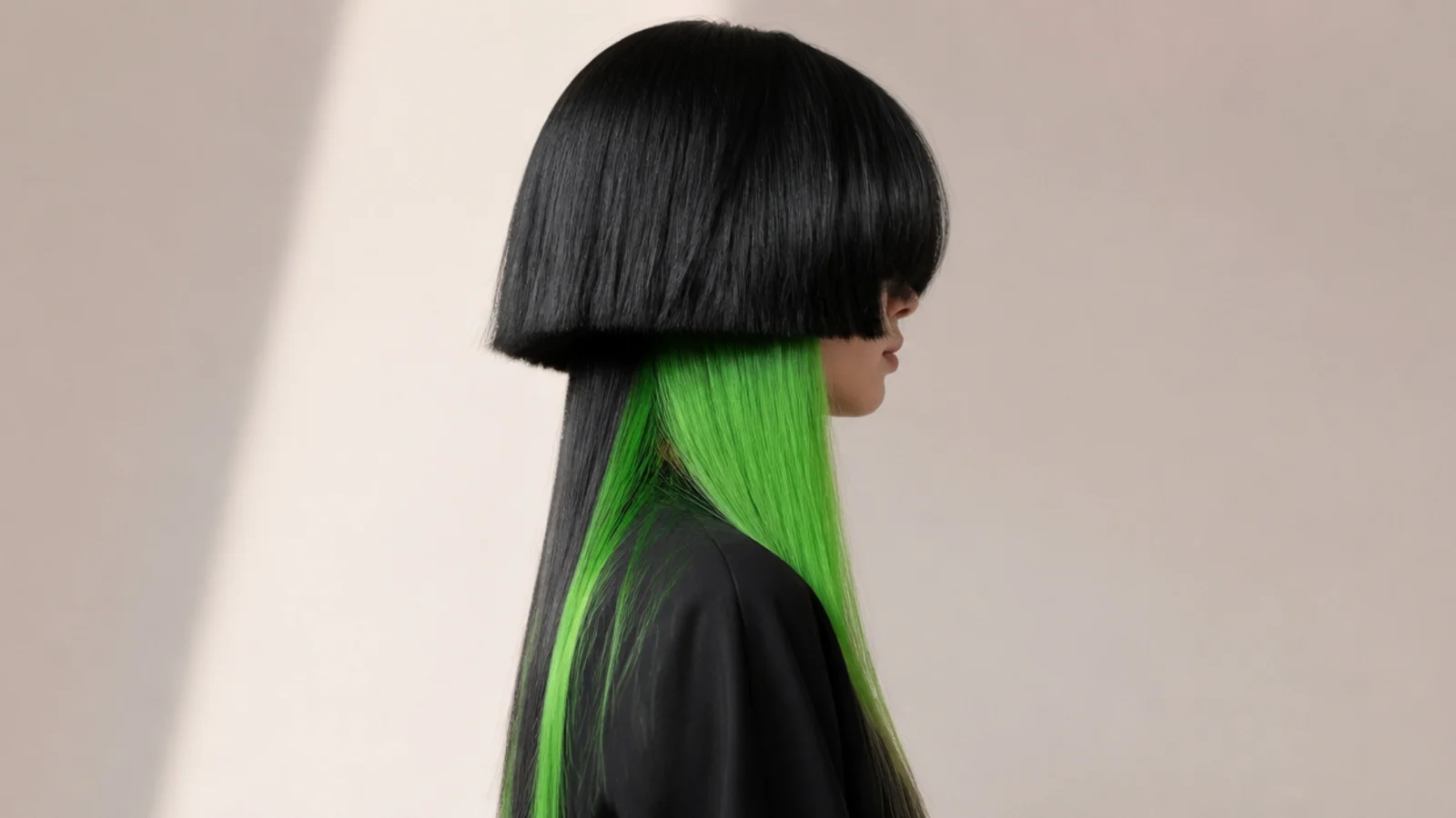 Cyber aesthetic jellyfish haircut with a black bell over neon green underlayer lengths