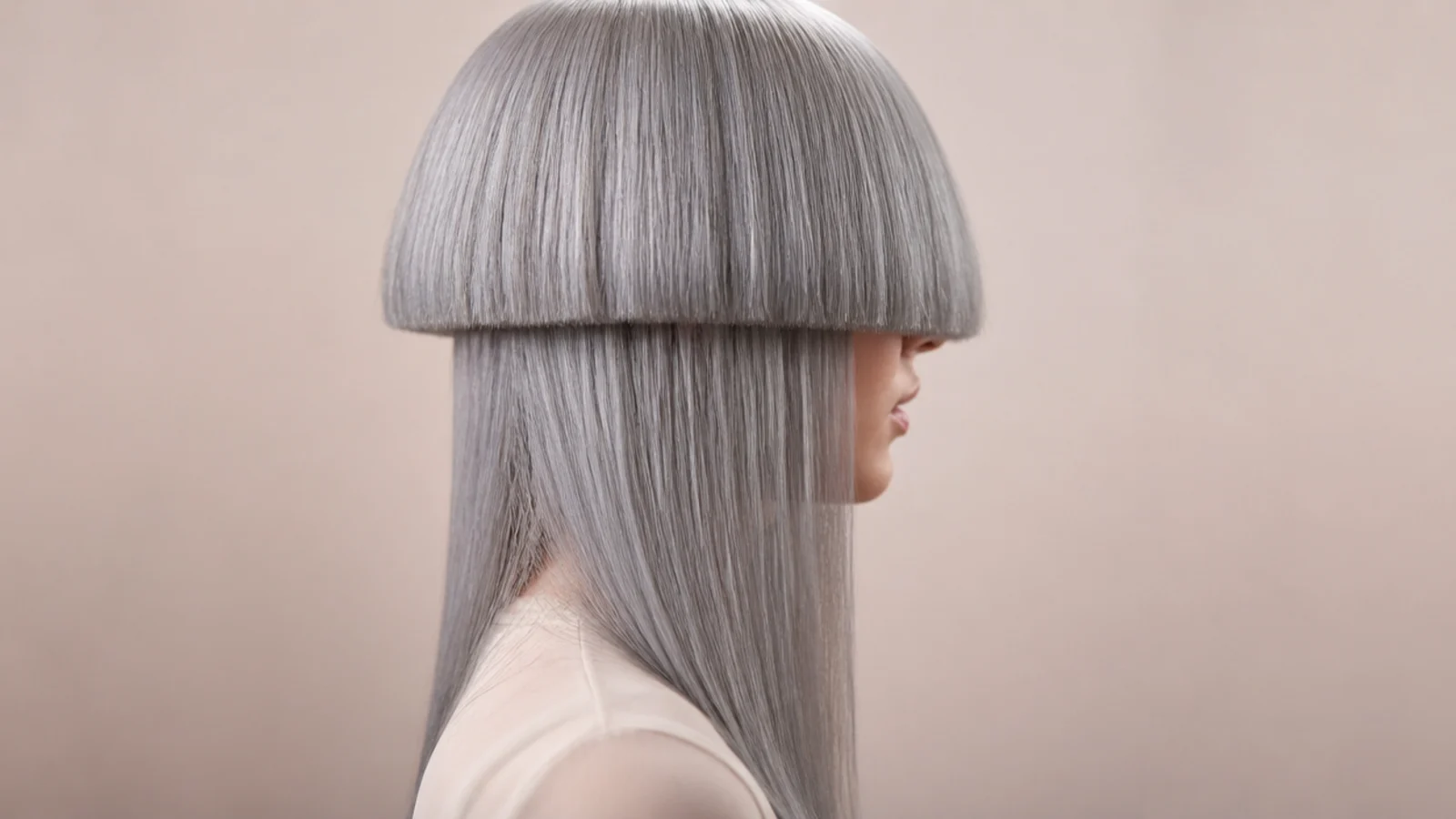 All over silver gray colored jellyfish haircut with a sharp bowl-shaped bell and long straight lengths