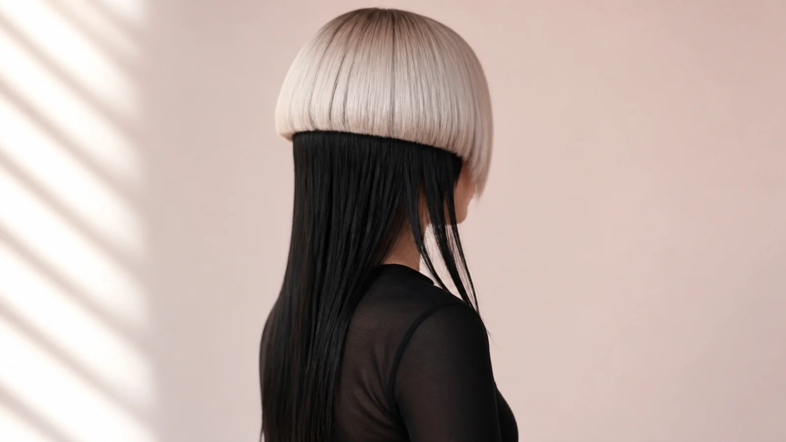 Edgy jellyfish haircut with a platinum bell color blocked over jet black long tentacle lengths