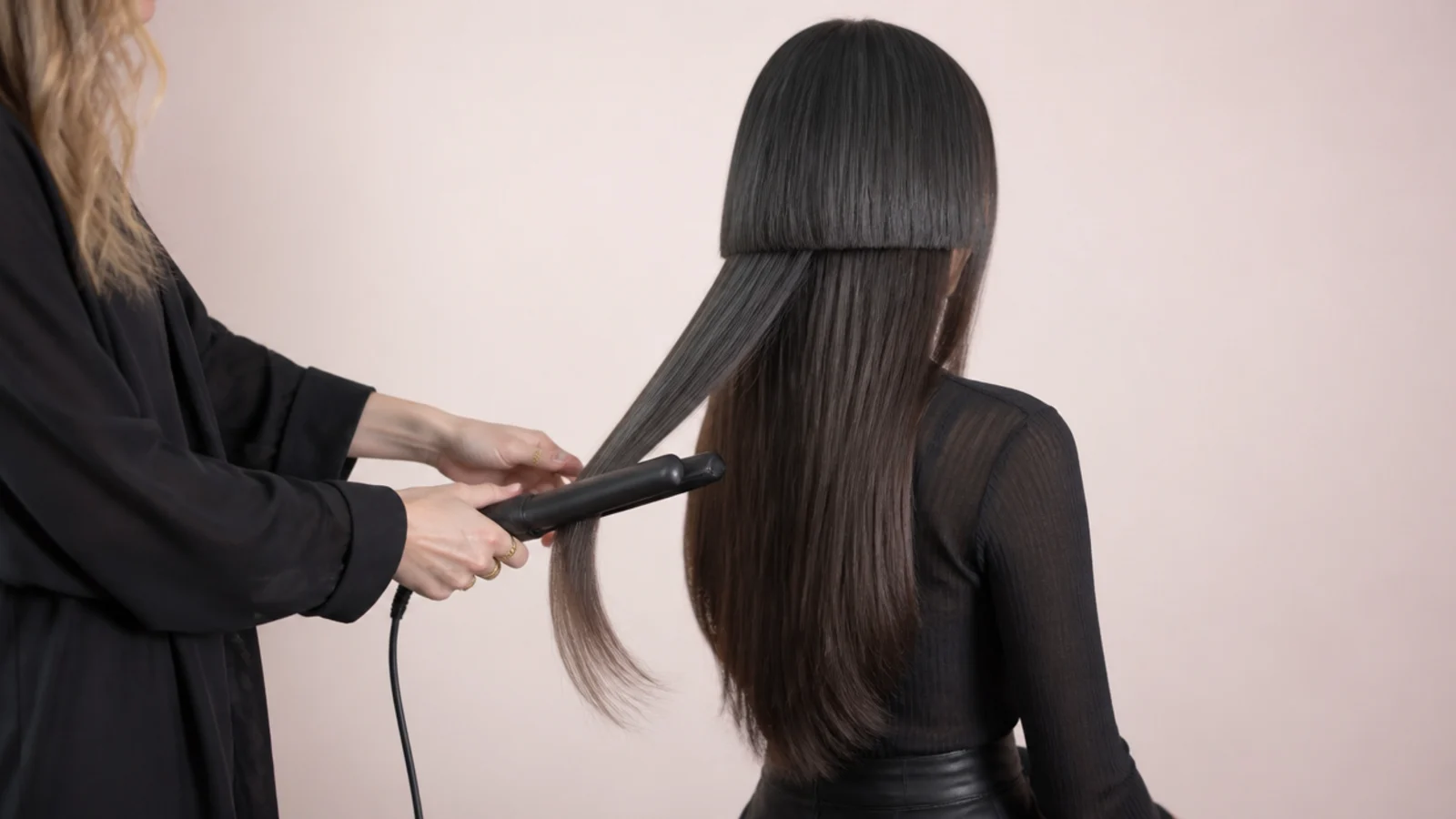 Flat iron flicking the ends of the long lengths on a jellyfish haircut