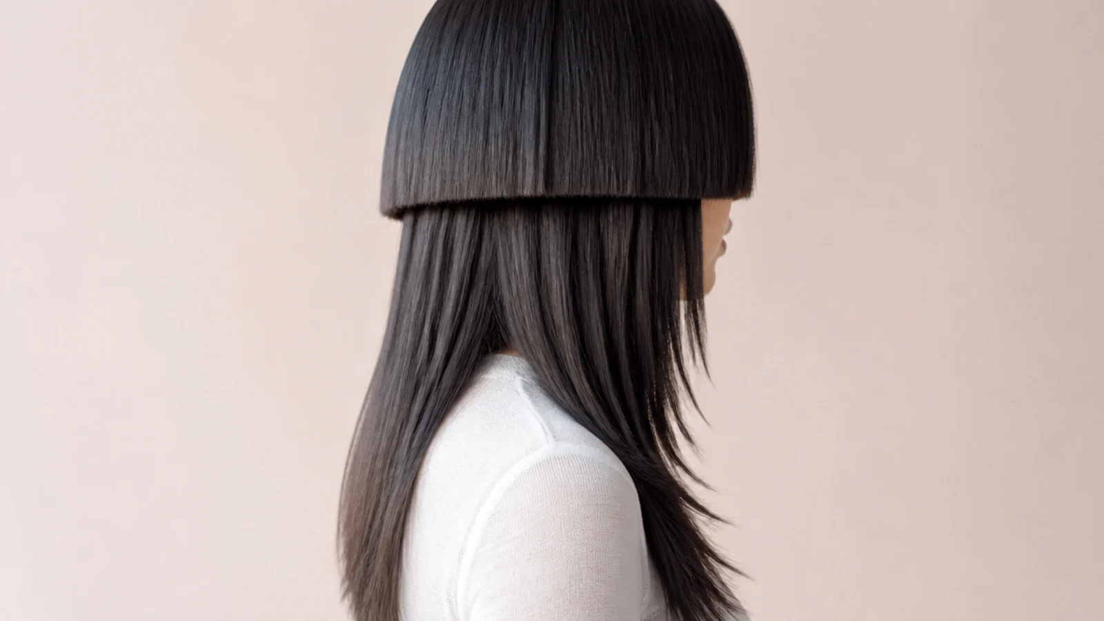 Blunt bowl shaped jellyfish bell over razored feathered tentacle ends on long straight hair