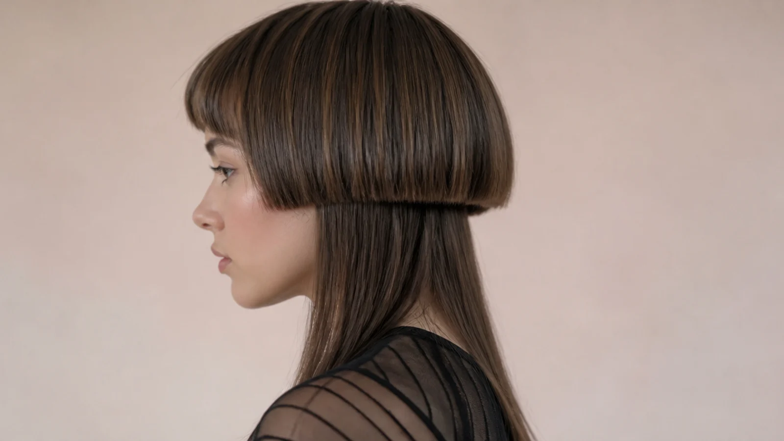 Medium jellyfish haircut with wispy micro bangs above the eyebrows and a rounded bell layer