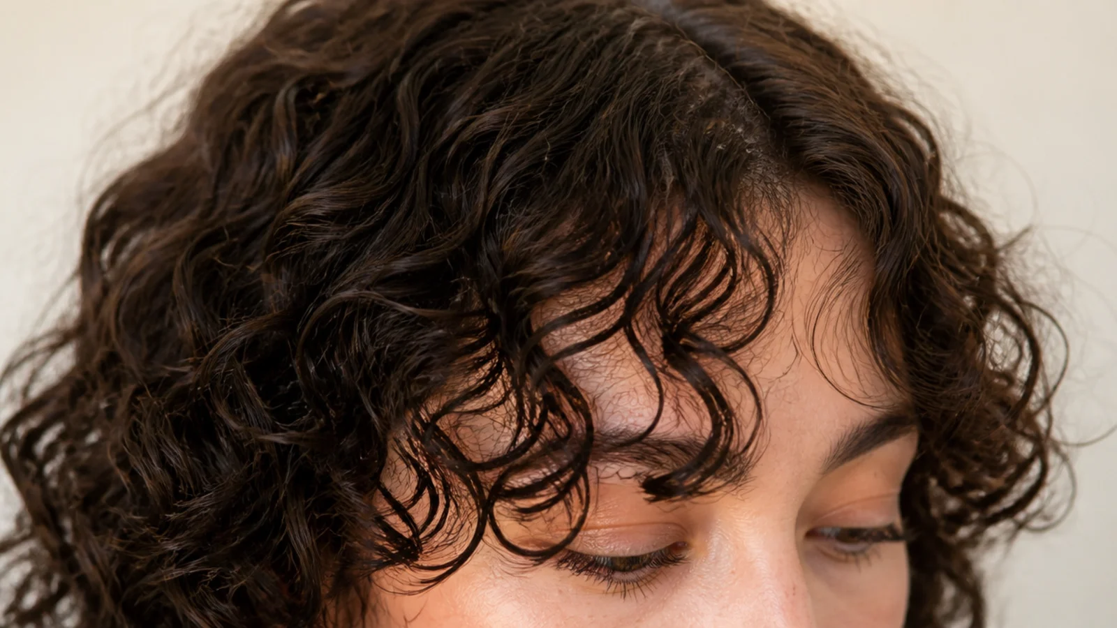 Wispy curly short curtain bangs on fine 3a curls, see-through at the ends and light at the root