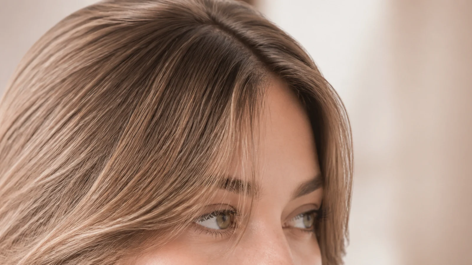 Wispy grown out short curtain bangs at half an inch of growth with see-through tapered ends