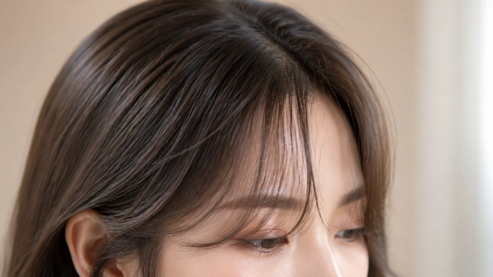 Lash-grazing Korean short curtain bangs parted in the middle with wispy tapered ends