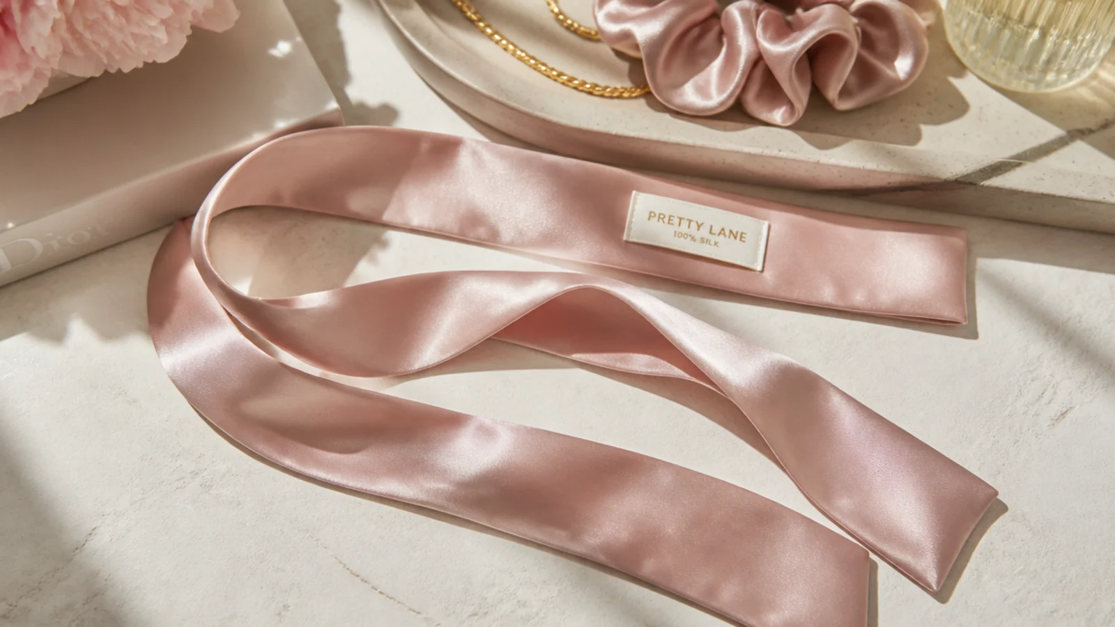 Faceless flat lay of a flat 100 percent silk curling ribbon for gentle heatless waves