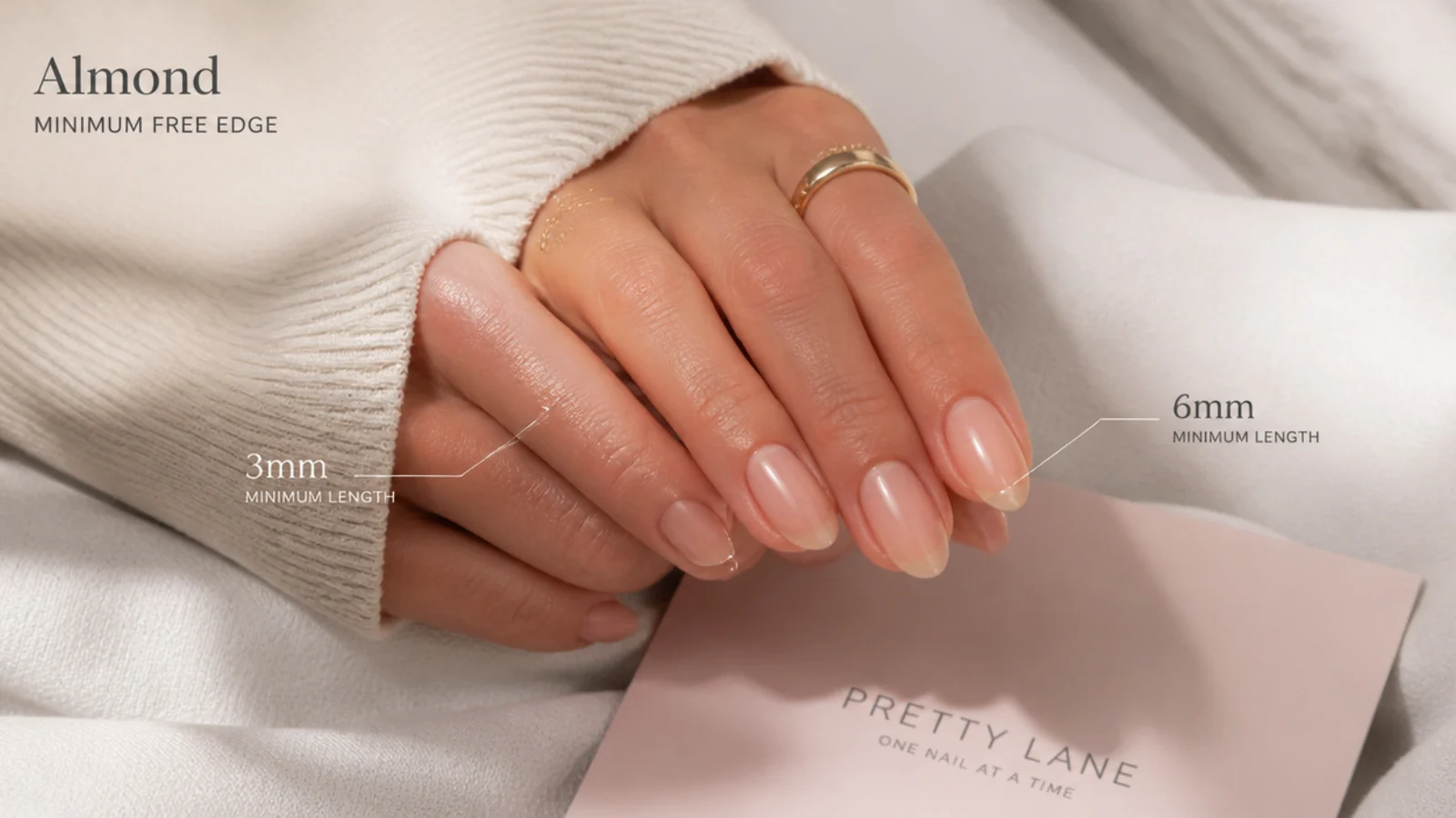 Almond nails at three millimeters and six millimeters compared to show the minimum free edge
