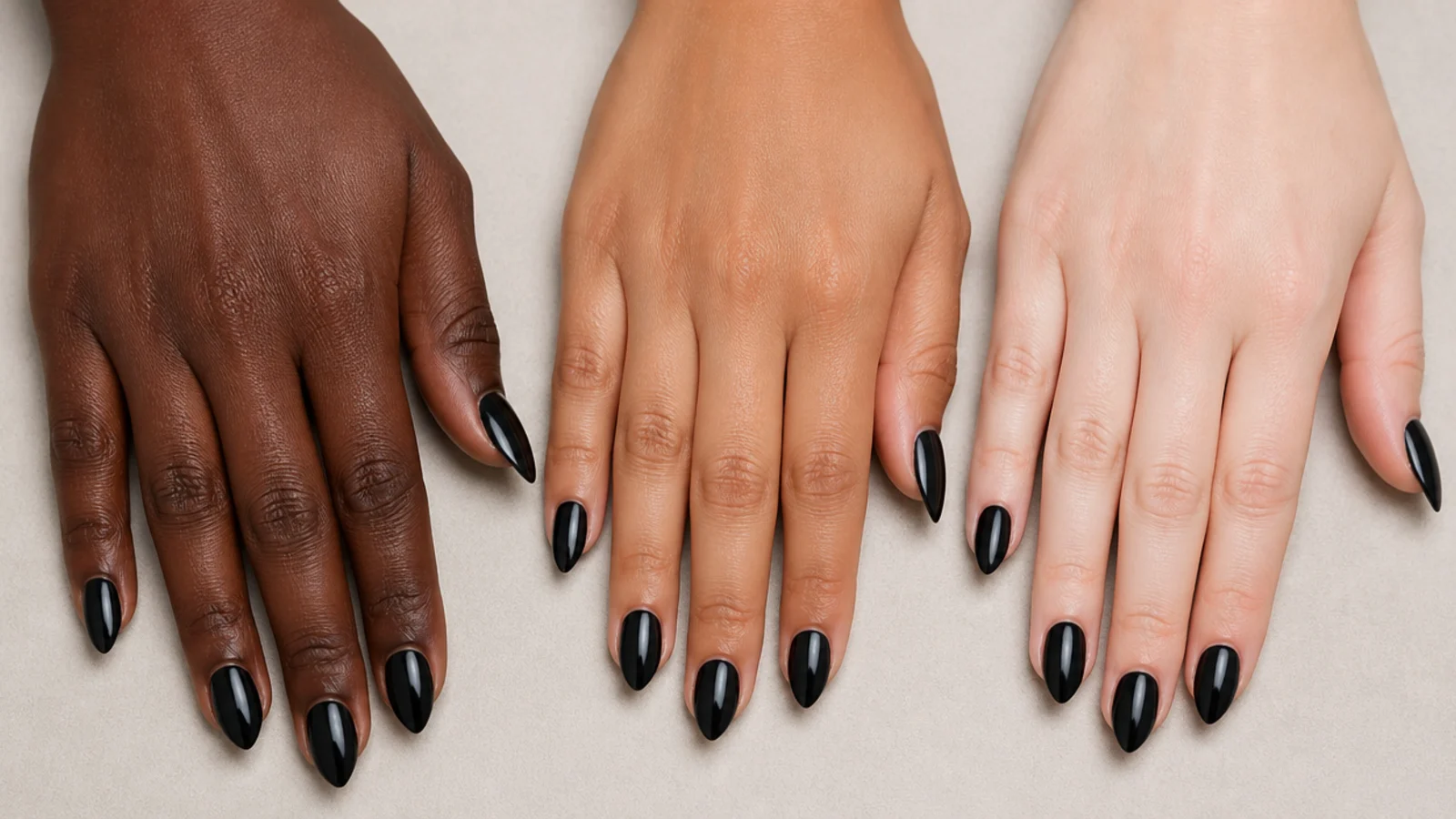 Three hands with deep medium and fair skin compared wearing glossy black almond nails