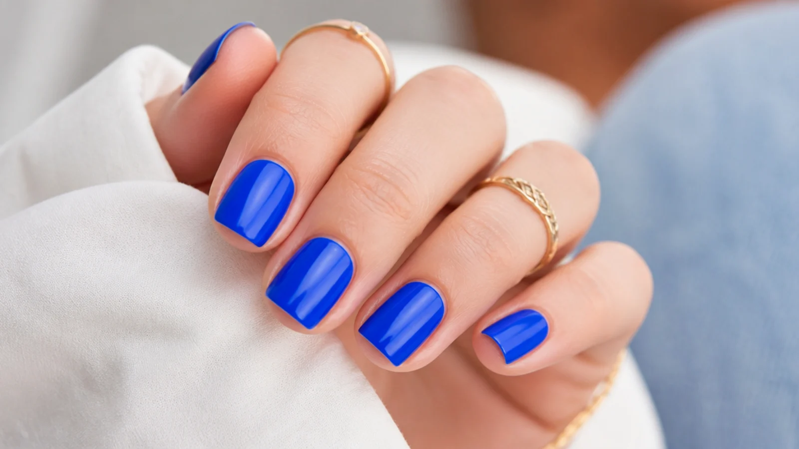 Short square cobalt blue summer nails in a vivid electric blue gloss