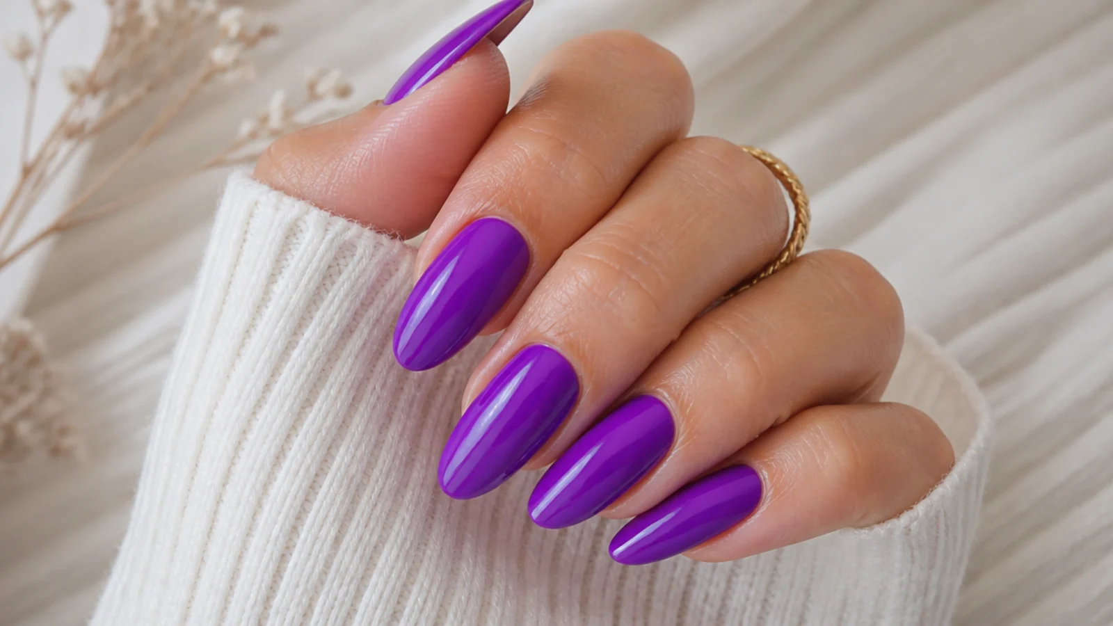 Long almond electric purple summer nails in a vivid saturated violet gloss