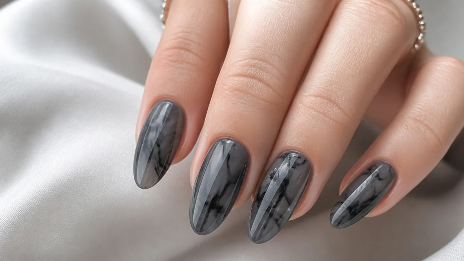 Charcoal gray and black smoke swirl blooming gel nails