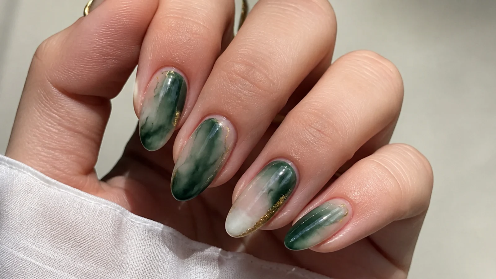 Emerald green watercolor blooming gel nails with soft edges