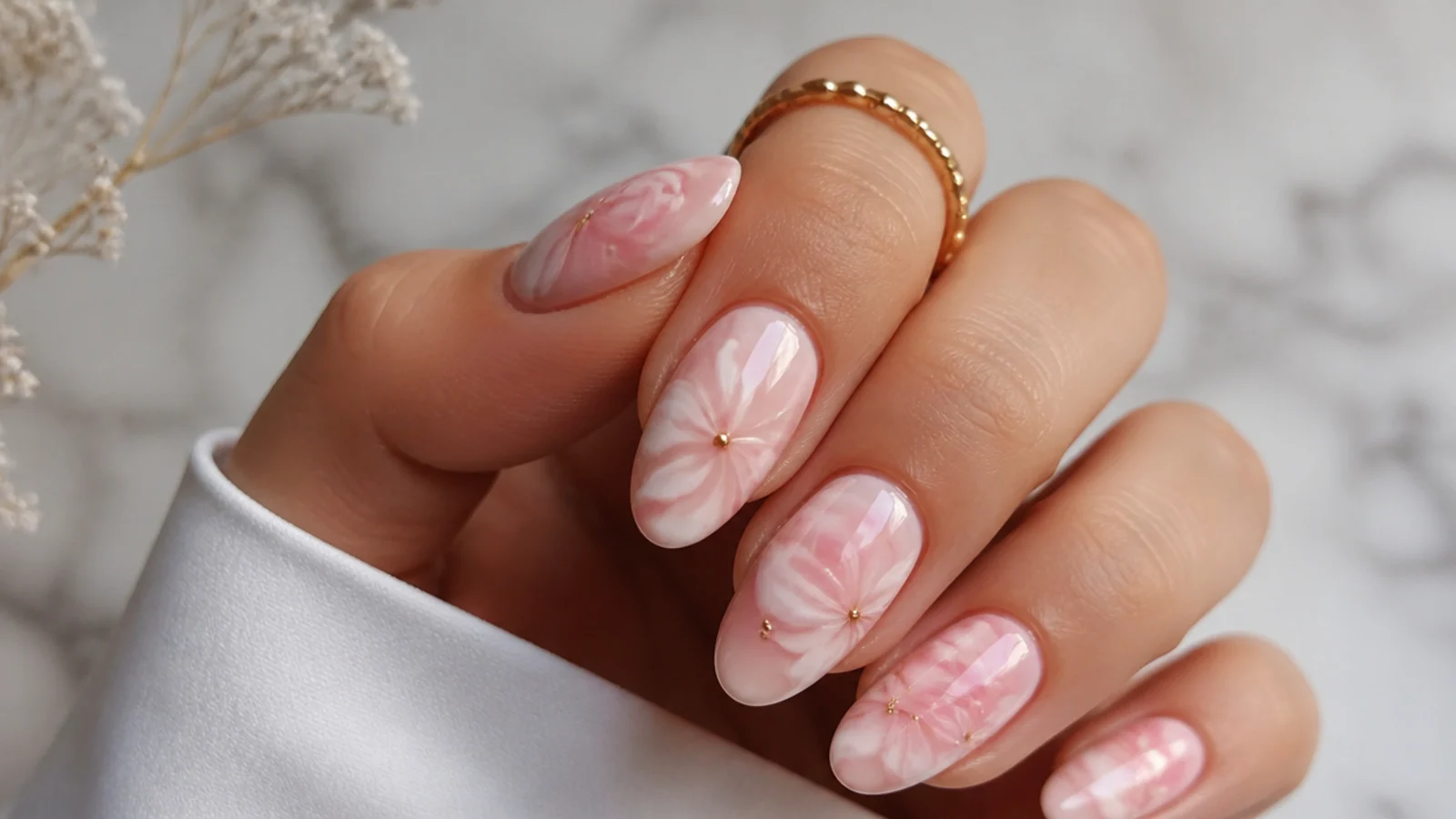 Soft pink and white swirled blooming gel nails