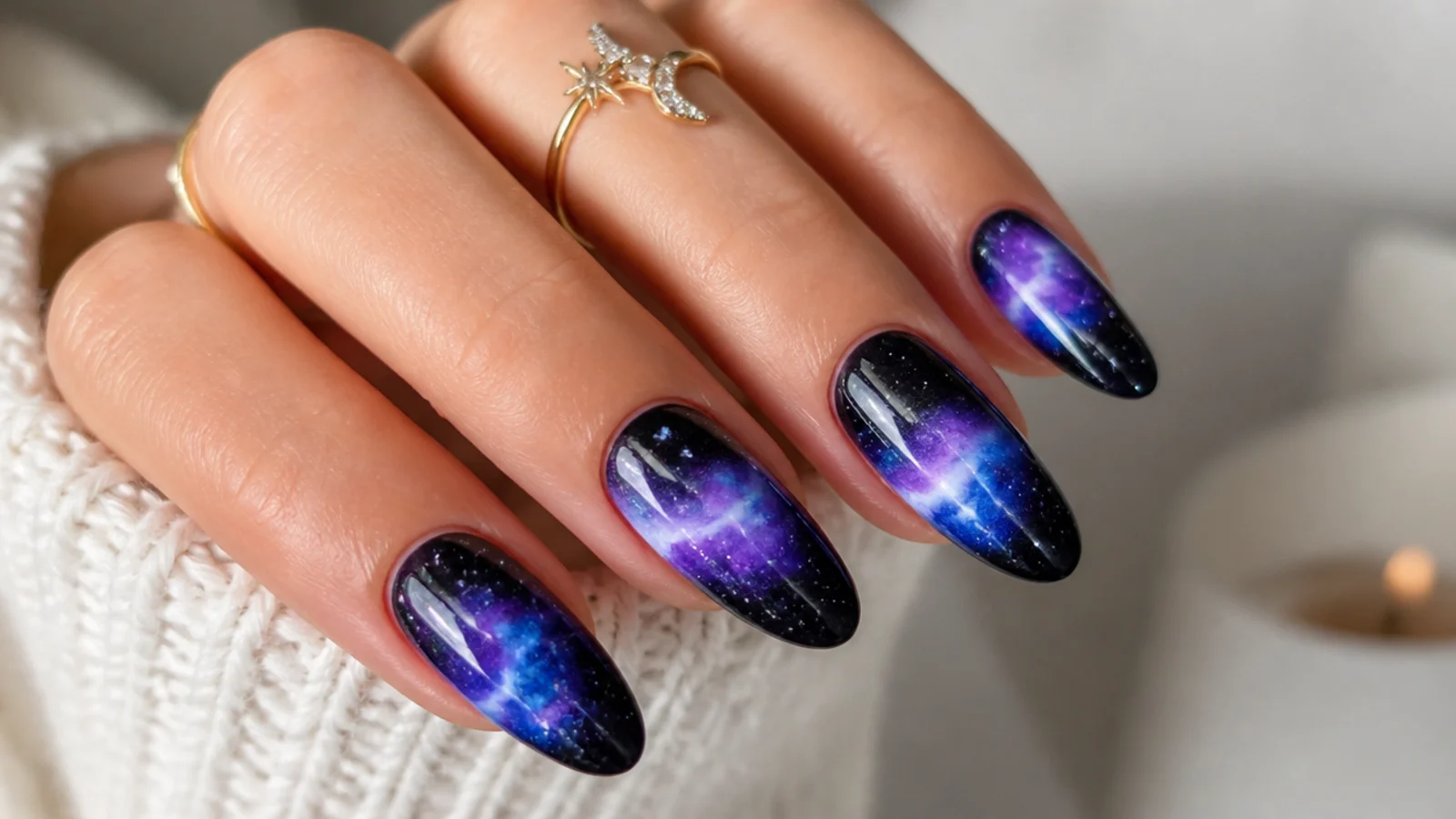Purple, blue and black galaxy blooming gel nails with fine glitter