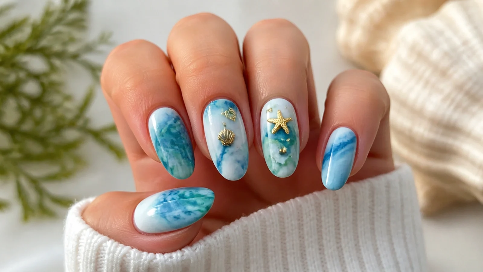 Teal, blue and white ocean tie-dye blooming gel nails