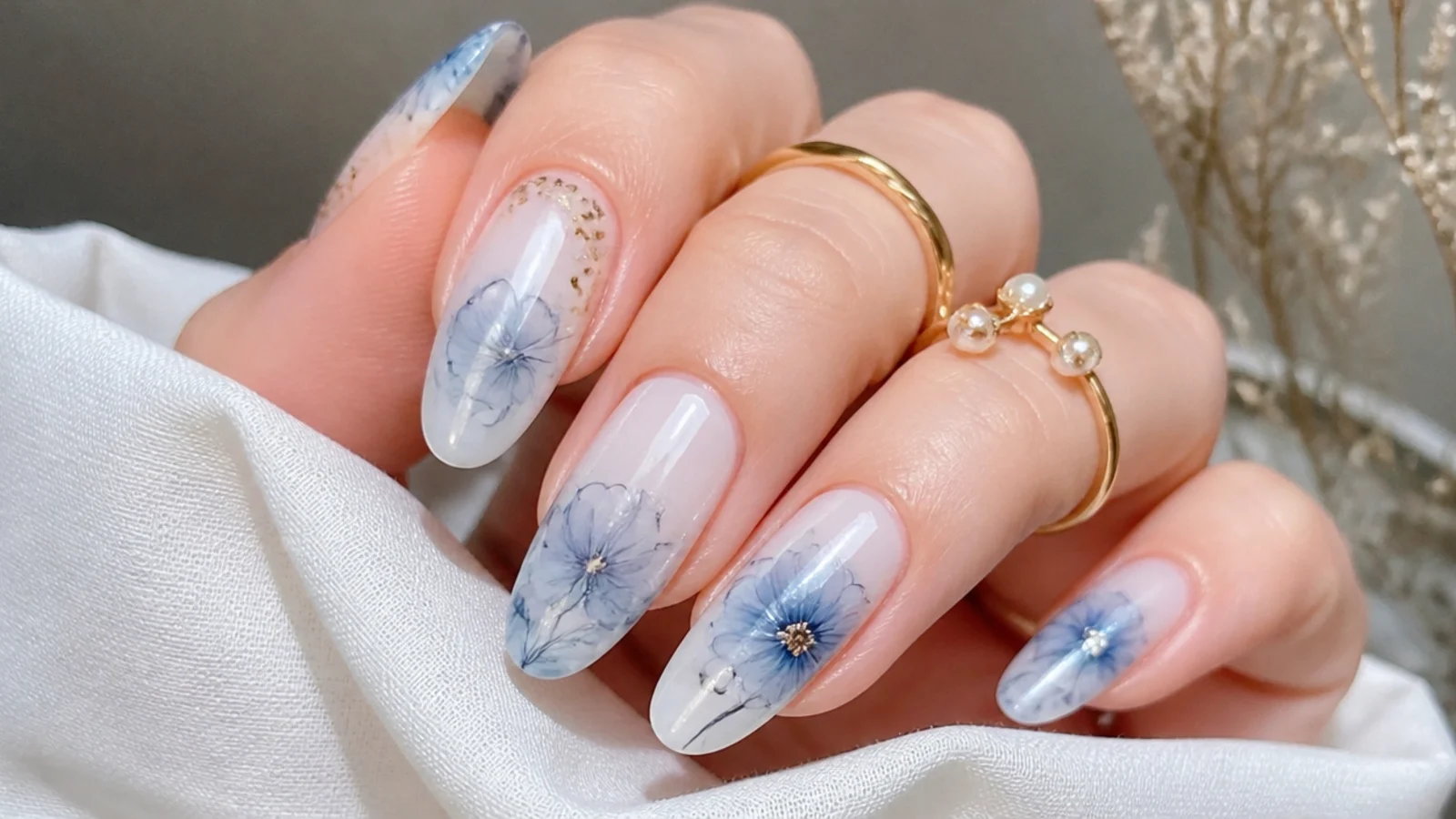 Soft baby blue watercolor flower blooming gel nails