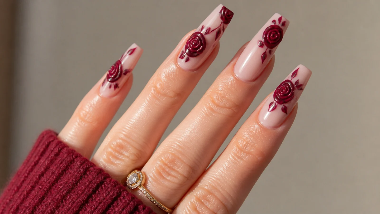 Coffin nails with deep burgundy rose blooming gel flowers over nude